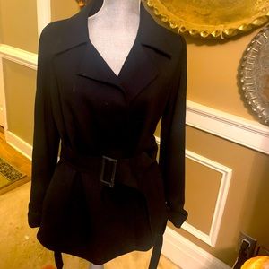 Black belted car coat. Light weight with silky lining. Really nice .